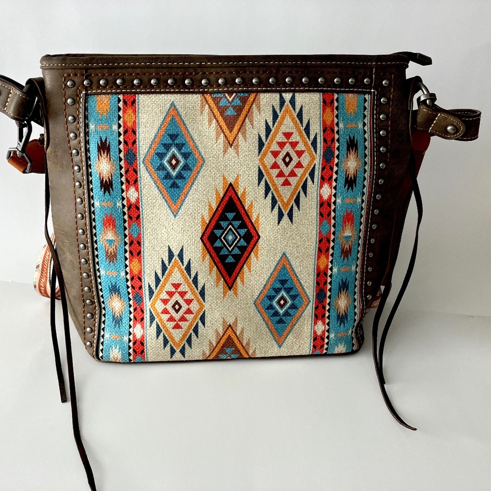 MONTANA WEST CONVERTIBLE BAG LOOKS NEW